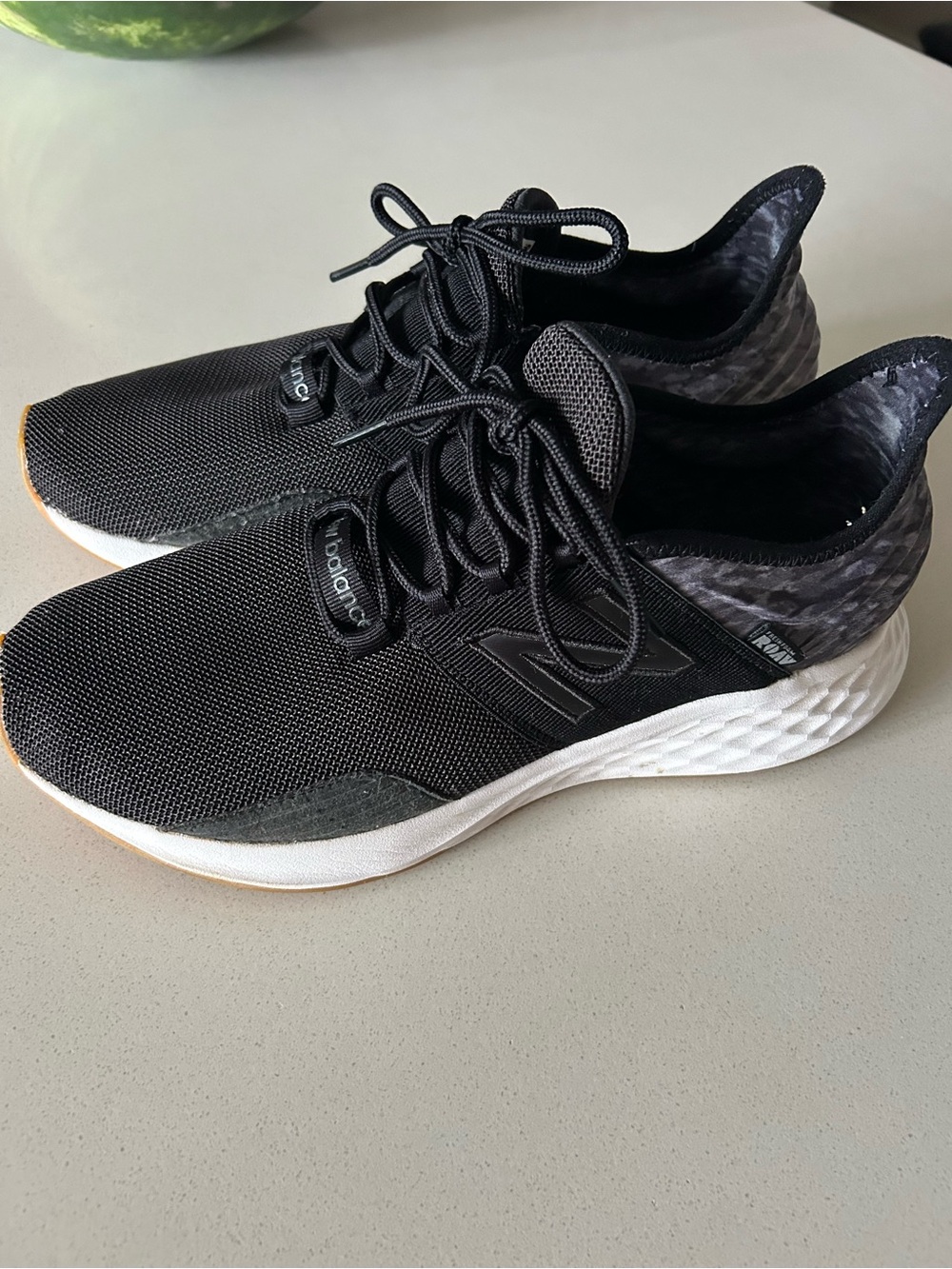 New Balance Men’s Black Knit Lace-Up Sneakers with White Sole